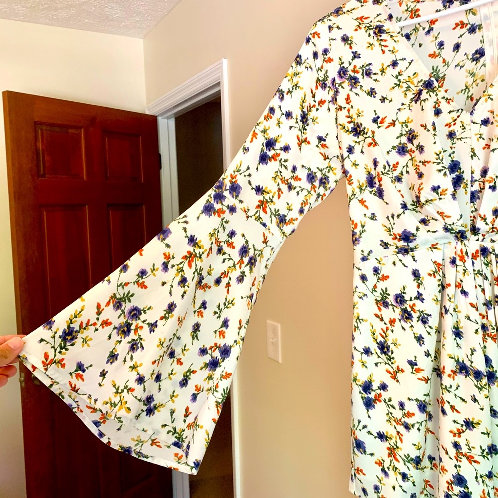 Floral romper - super cute! Bell sleeved